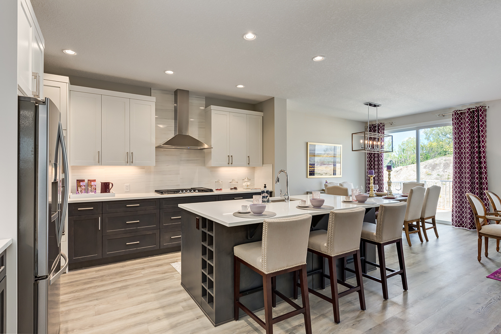 Kitchen with light and dark cabinets to demonstrate colour blocking trend